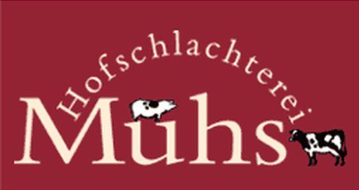 Logo von „Joldelunder Bio-Backspezialitäten“ in ovaler Form: dunkelblauer Schriftzug „Joldelunder“, darunter grün-blau „Bio-Backspezialitäten“, links davon stilisierte grüne Ähre, eingefaßt von einem hellblauen Ovalsrahmen.